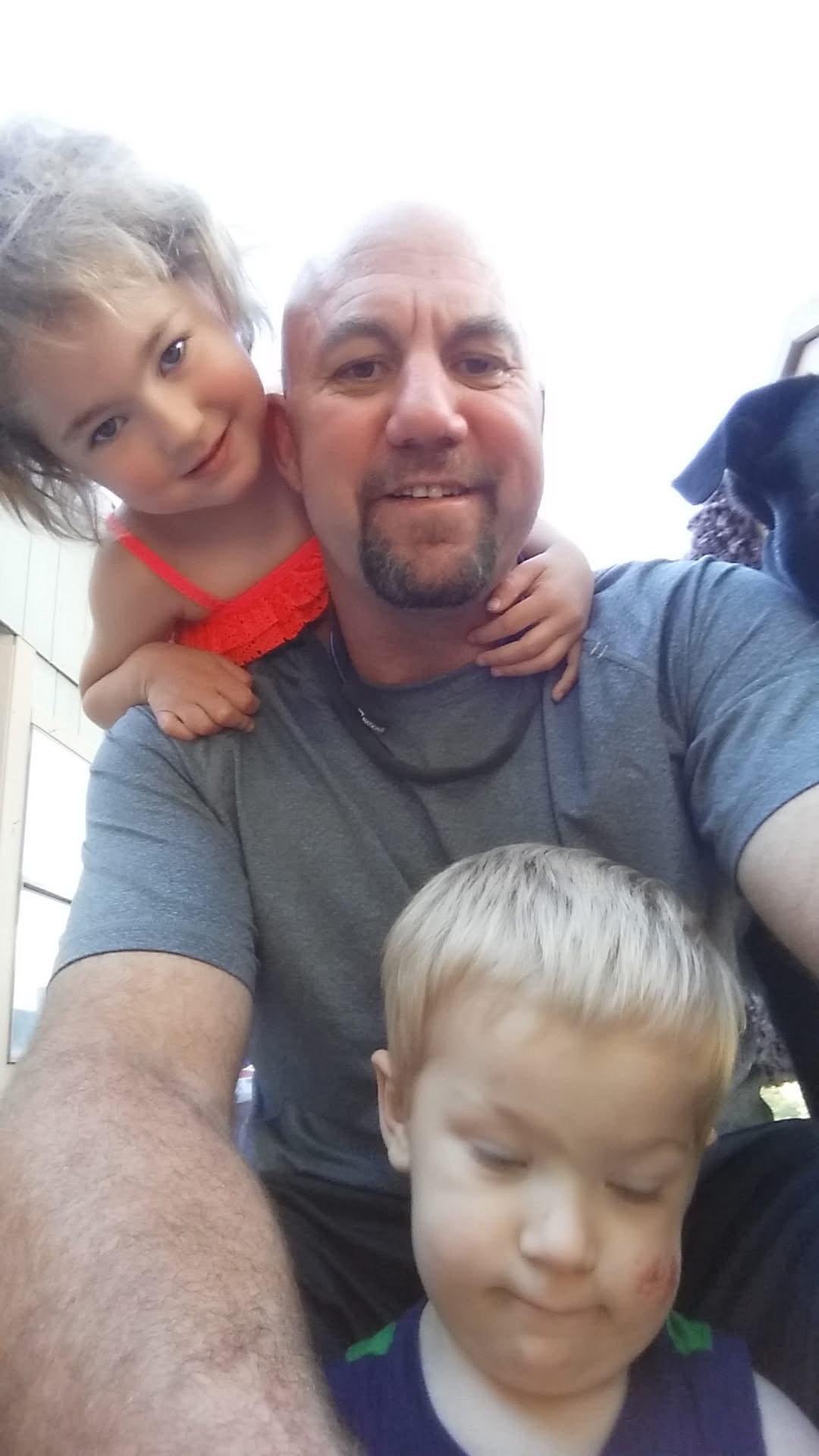 Jake Farmer with his two children when they were young