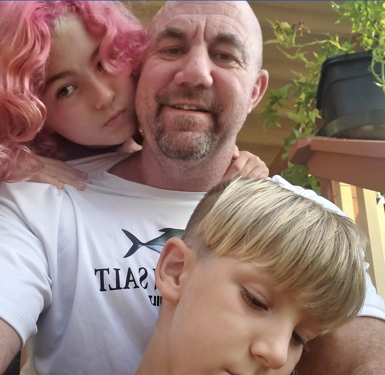 Jake Farmer with his two children as they grew older